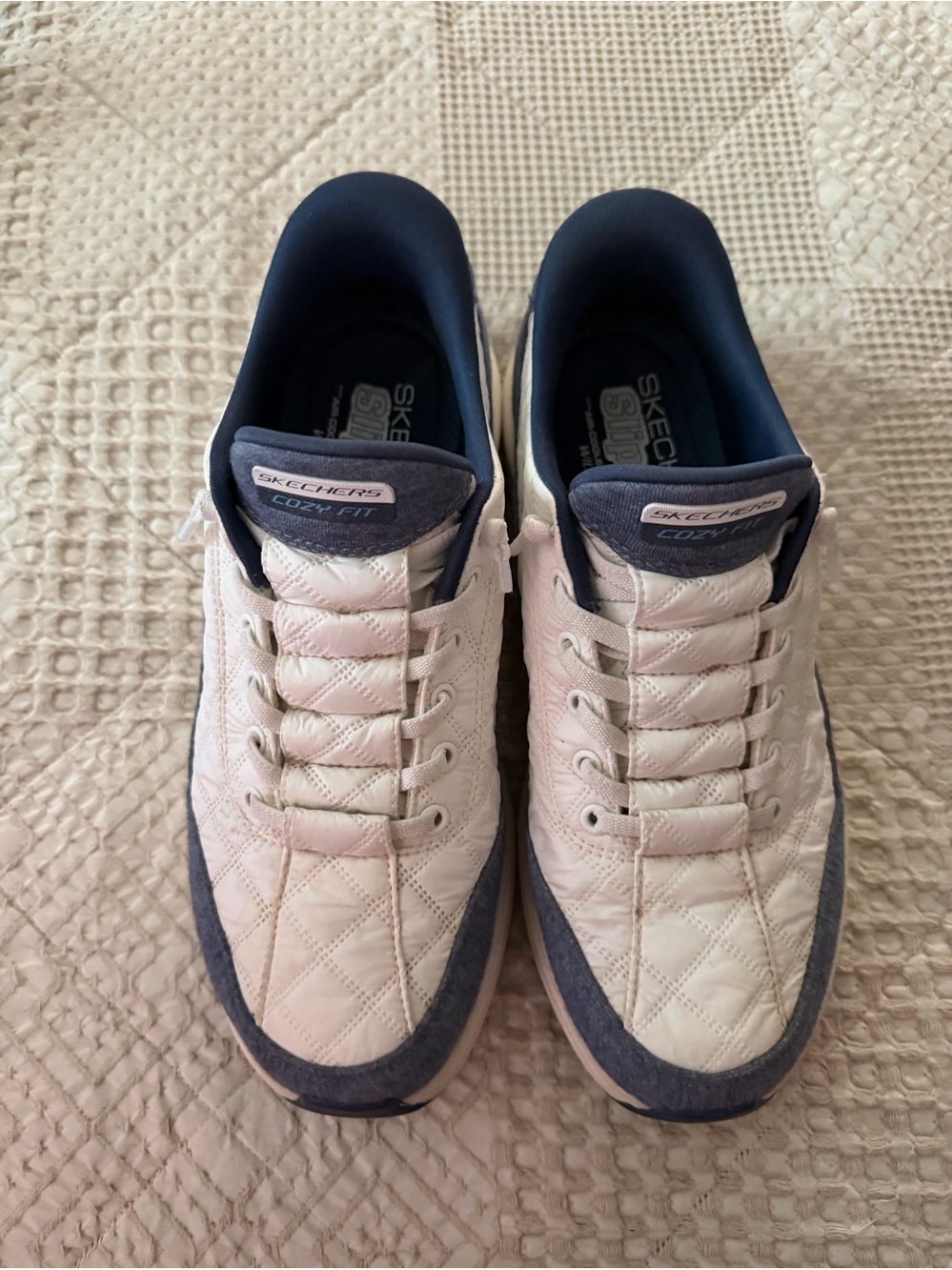Skechers Women’s Cozy Fit Quilted Sneakers in White and Navy